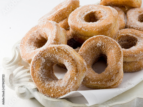 Rosquillas de anis con azúcar, sobre fondo blanco. Anise donuts with sugar, on white background photo