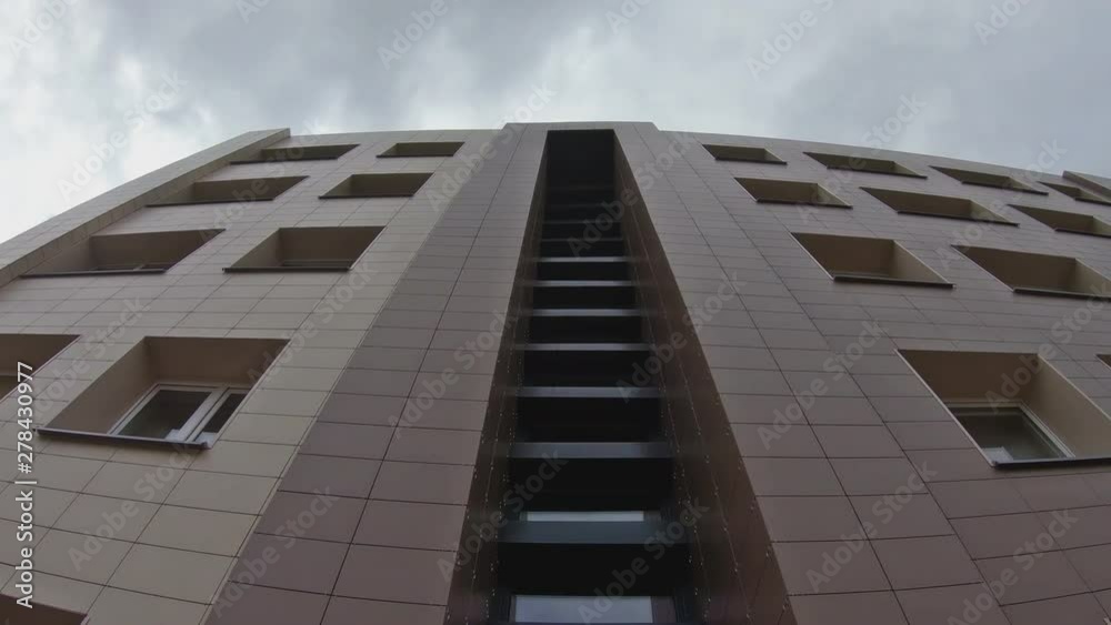 Renovated Building On A Cloudy Day. Slow Motion Renovated Building On A Cloudy Day. Slow Motion