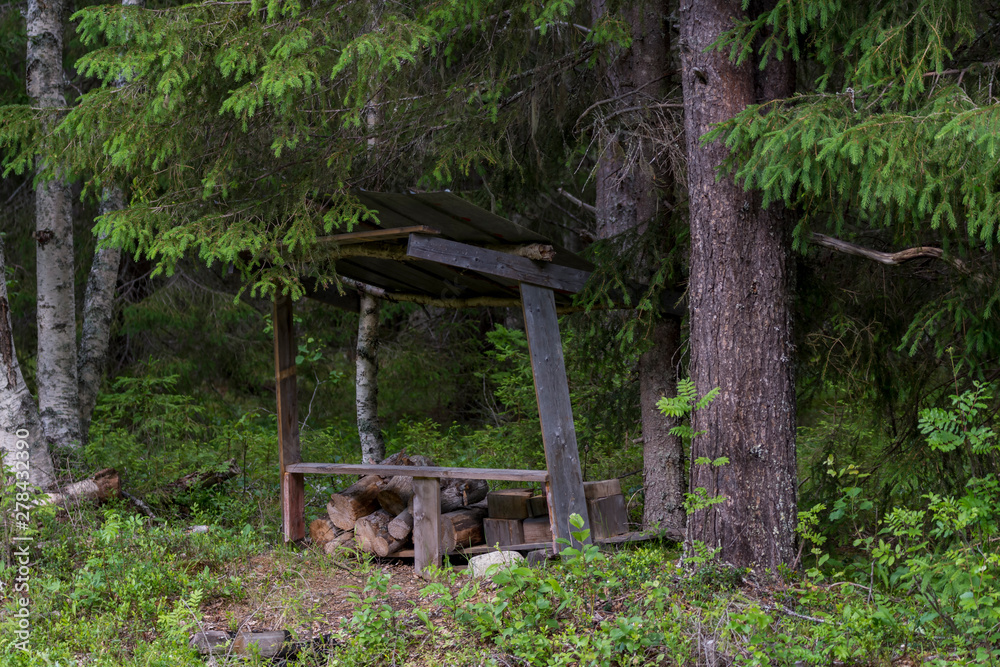 Typical simple Moos hunting shelter from the Northern Sweden Typical simple Moos hunting shelter from the Northern Sweden