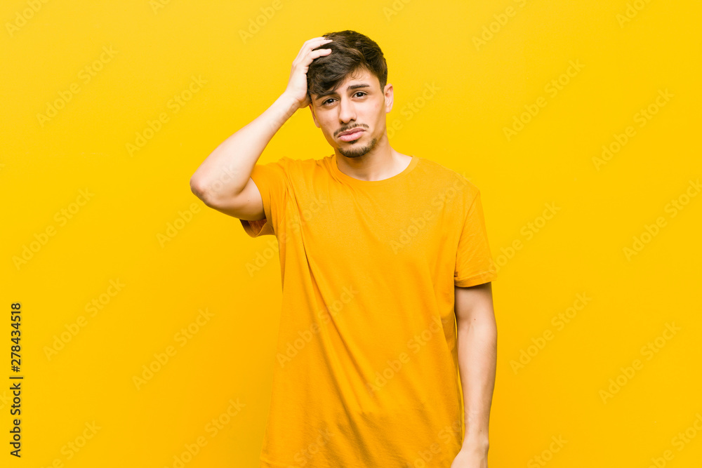 Young hispanic casual man being shocked, she has remembered important meeting. Young hispanic casual man being shocked, she has remembered important meeting.