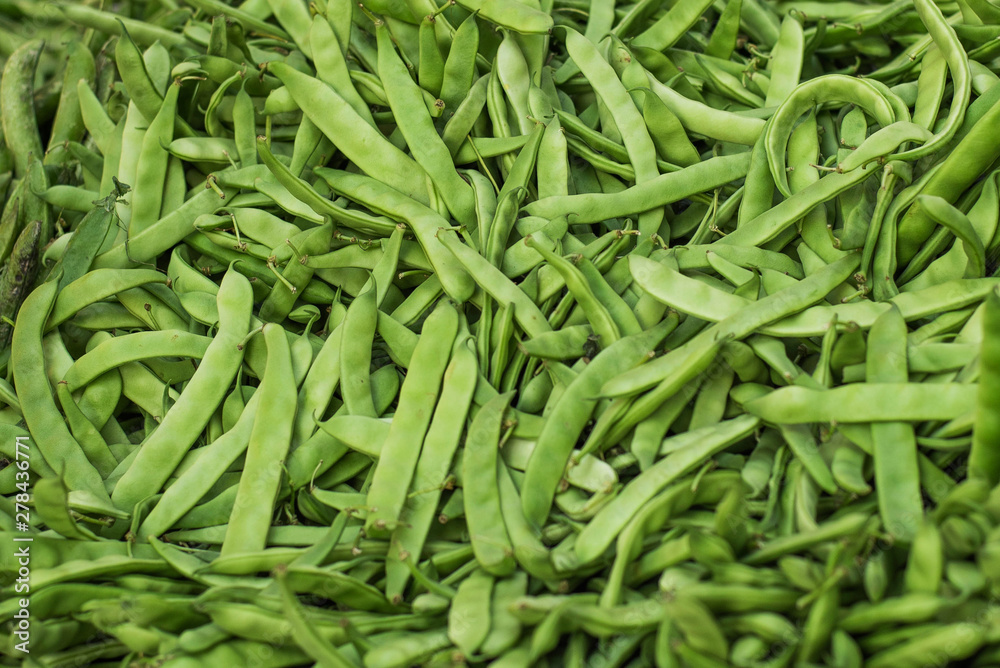 green bean string close up. background: green wax beans green bean string close up. background: green wax beans