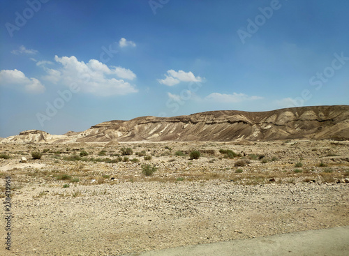 Desert landscape with rocks, hills and mountains © Studio-M
