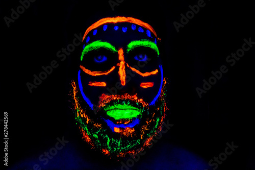 Man with neon makeup for a Neon Party For halloween