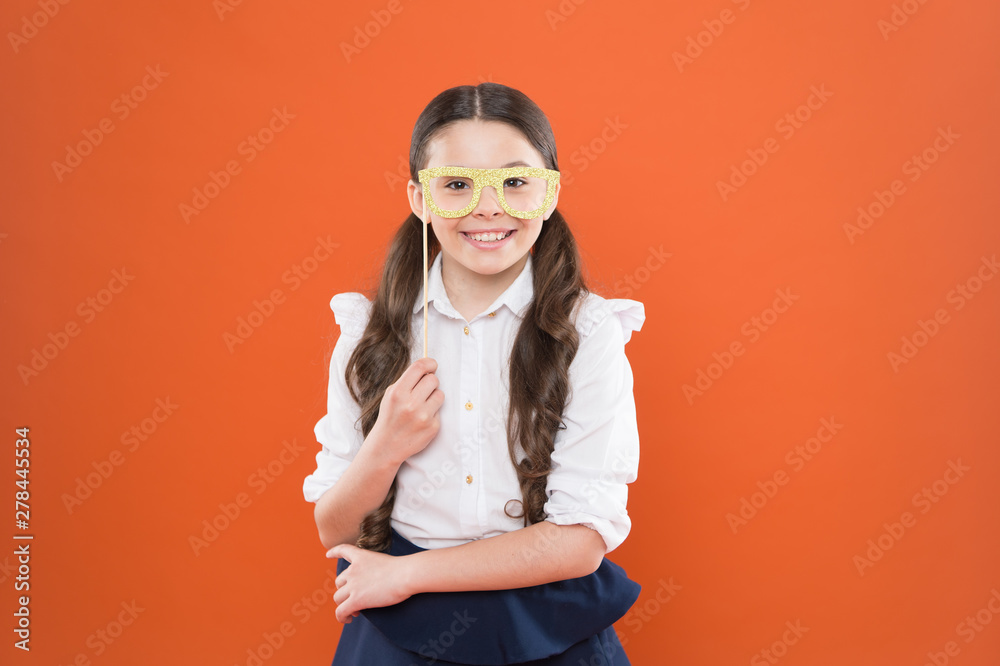 Always question. school girl in uniform. child with party glasses. smart and intelligent kid on orange background. back to school. funny study. knowledge day. happy childhood. small girl student Always question. school girl in uniform. child with party glasses. smart and intelligent kid on orange background. back to school. funny study. knowledge day. happy childhood. small girl student