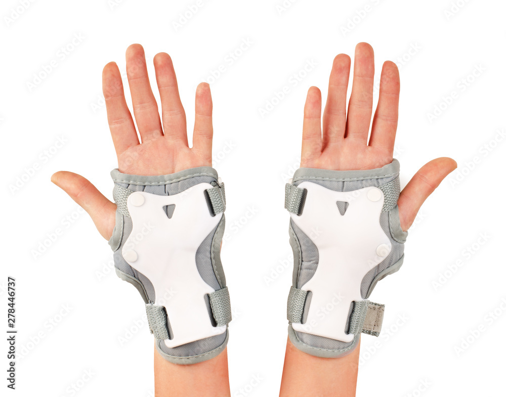 Obraz premium Roller skater wearing wards guards protector pads, wrist protection on hands woman