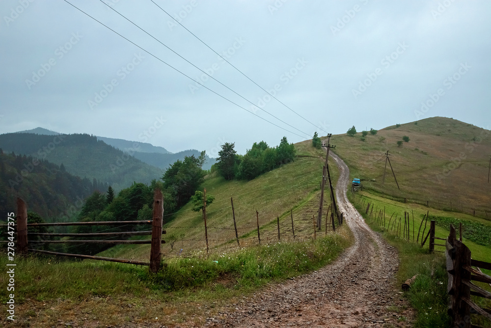Mountain, beautiful summer landscape, road in the mountains, sky, summer. Ukraine, the Carpathian Mountains. Concept of travel, tourism, holidays, vacation