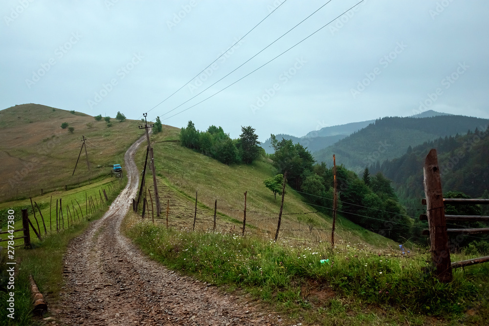 Mountain, beautiful summer landscape, road in the mountains, sky, summer. Ukraine, the Carpathian Mountains. Concept of travel, tourism, holidays, vacation