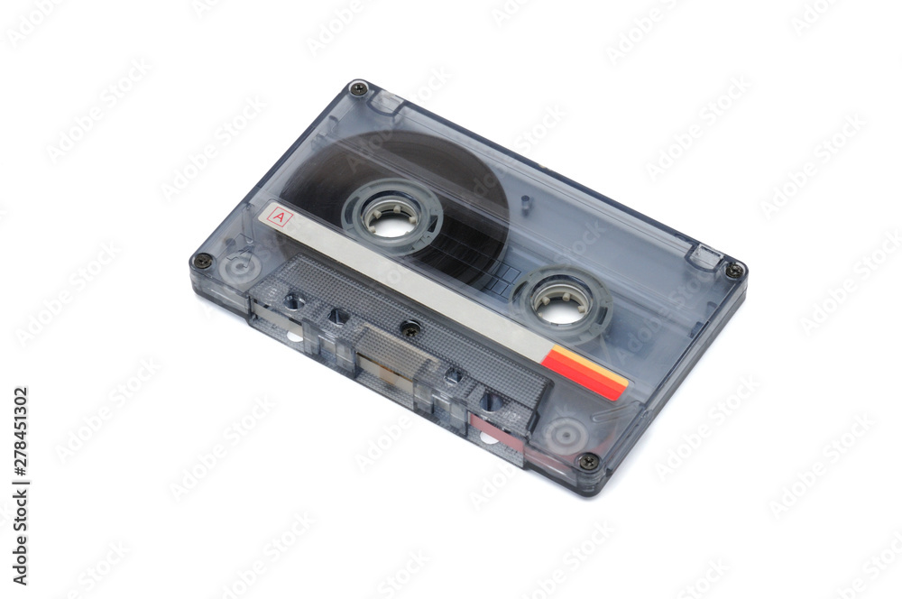 Compact audio tapes for magnetic recording on a white background.Compact cassette Compact audio tapes for magnetic recording on a white background.Compact cassette