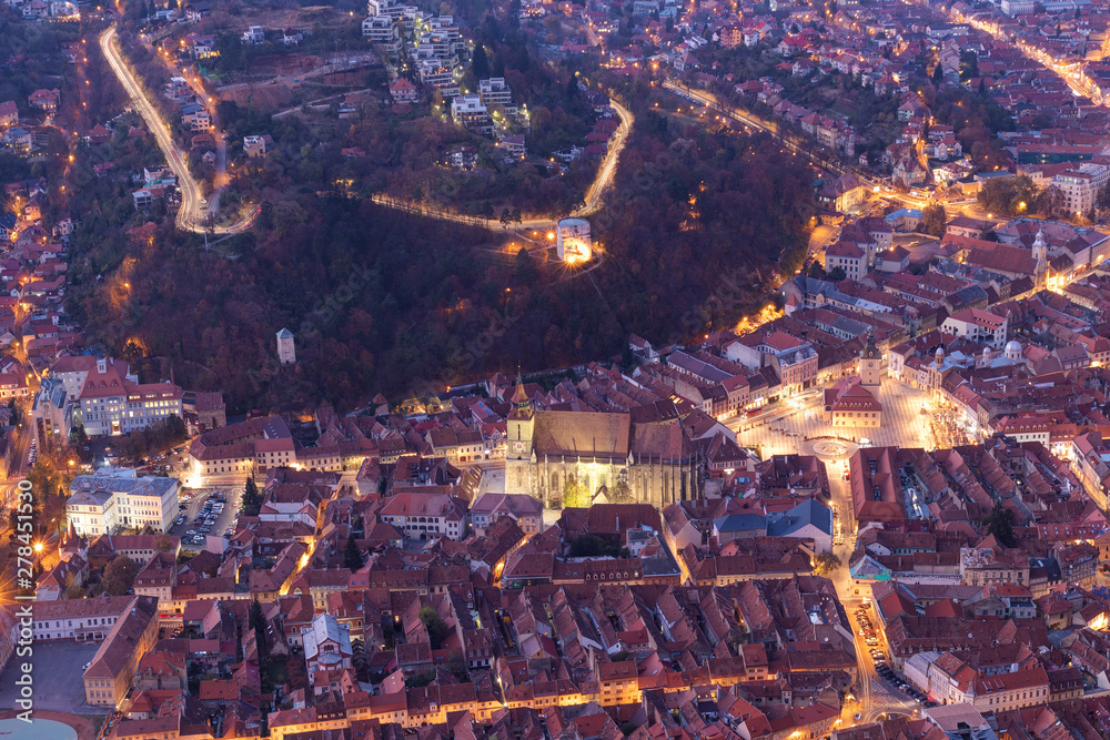 Brasov, Romania: Panoramic view of the city center from Tampa Mountain at dusk