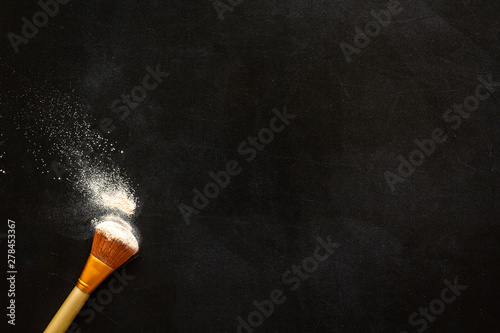 Instruments for make up with brushes on black background top view mock up photo