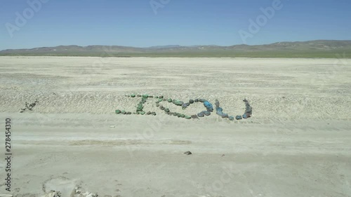 Aerial of the words I love you written in rock formation. Salt Wells, Nevada, USA.  photo