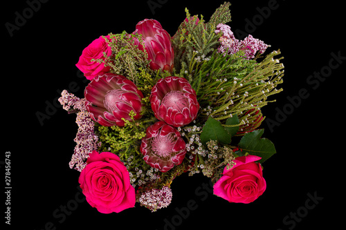 A bouquet of proteas and roses
