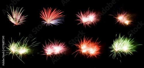 Beautiful Fireworks isolated on black collage  celebration and new year concept