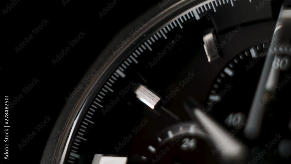 Wrist watch time lapse close up on a black background. white clock hands Wrist watch time lapse close up on a black background. white clock hands