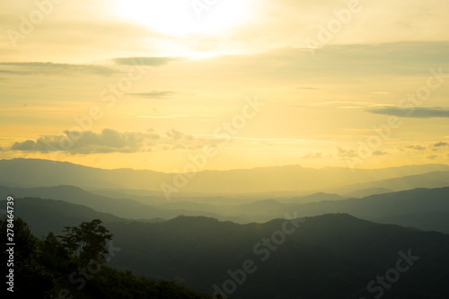 The longitudinal mountains and the setting sun and the forest on Doi Tung