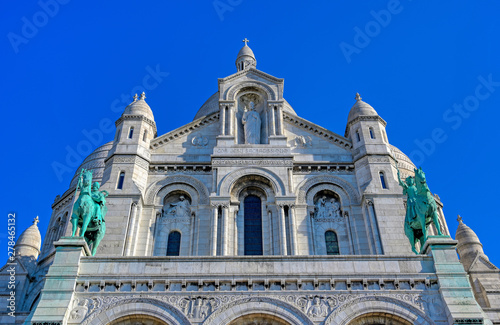 The Basilica of the Sacred Heart of Paris, commonly known as Sacré-Cœur Basilica, located in the Montmartre district of Paris, France. © Jbyard