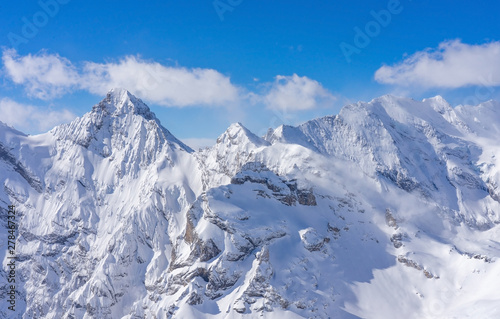 Stunning panoramic view of the Swiss Alps from the top of the Schilthorn mountain in the Jungfrau region of the country © navintar