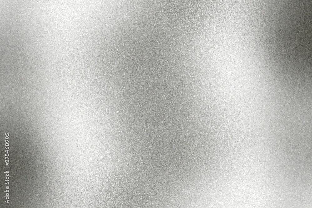 Light shining on old silver metallic wall, abstract texture background