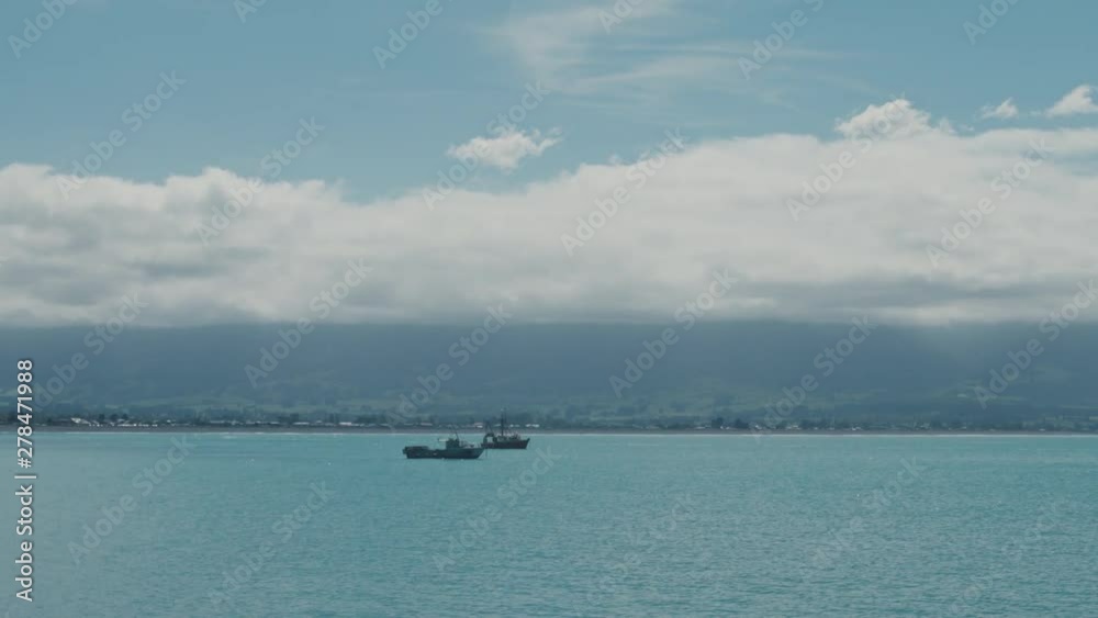 Group of Crayfish boats anchored just of shore of kiakoura, New Zealand Group of Crayfish boats anchored just of shore of kiakoura, New Zealand