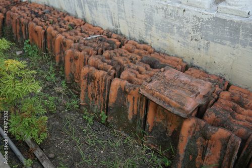 Row of the remaining Traditional Vintage Red Clay Roof Tile in the Village_6 photo