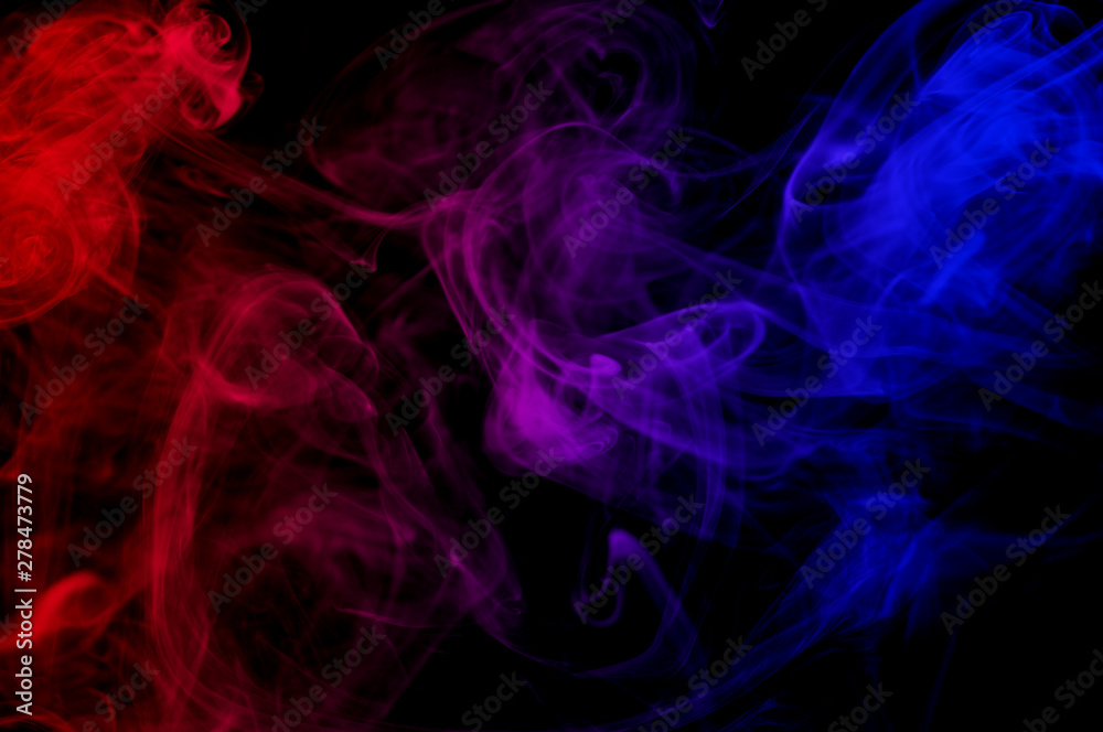 Fototapeta premium abstract red against blue gradient color smoke in the air on black background