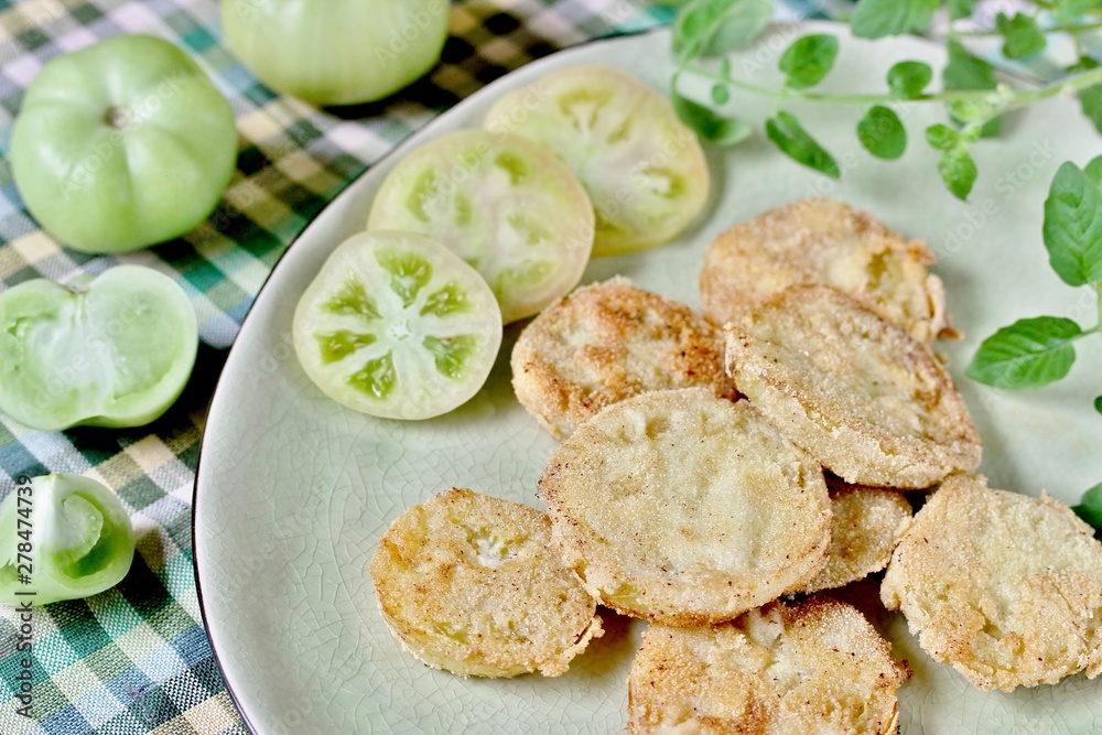 with fried green tomato. close-up. autumn dish. popular in America with fried green tomato. close-up. autumn dish. popular in America