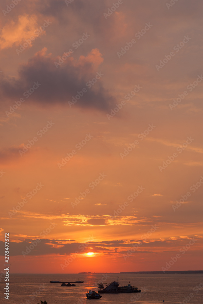 Fototapeta premium industrial ships at sunset
