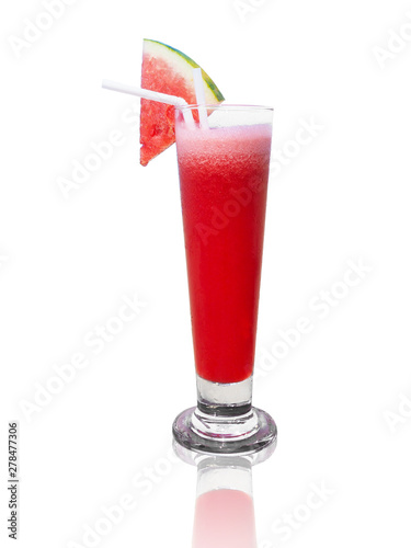 glass of watermelon juice with fruit sliced on top
