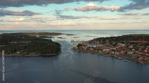 Aerial flight over the town of Sandhamn. A town on the Swedish Archipelago photo