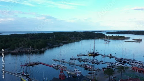 Drone flies slowly over Sandhamn marina, a town on the Stockholm Archipelago. photo