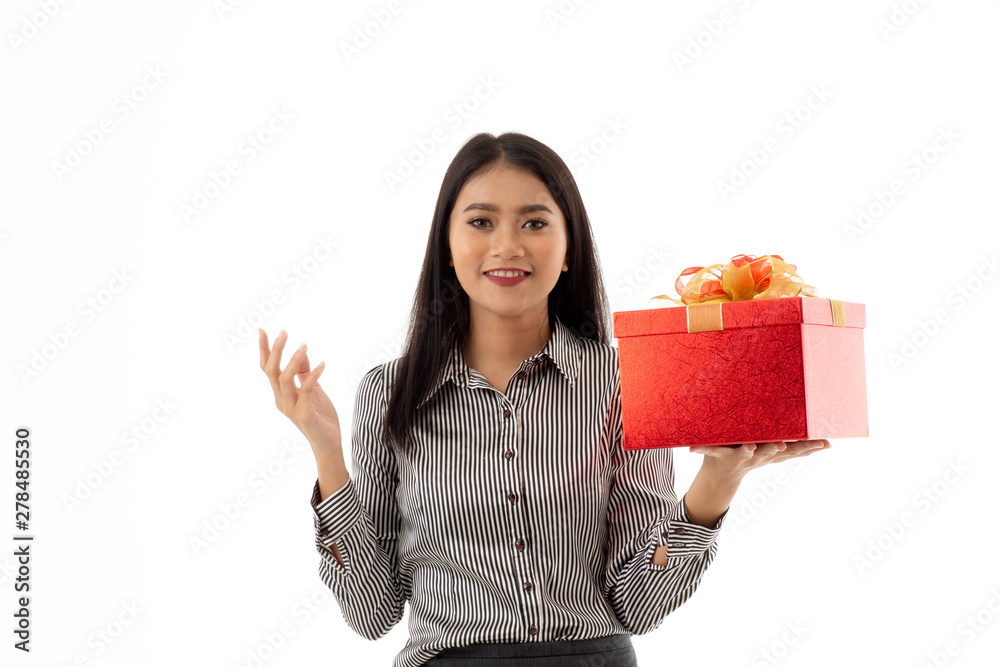 Pretty smiling asian young woman holding beautiful red present box and opening hand palm isolated on white background. Portrait of business woman looking at the gift. Pretty smiling asian young woman holding beautiful red present box and opening hand palm isolated on white background. Portrait of business woman looking at the gift.