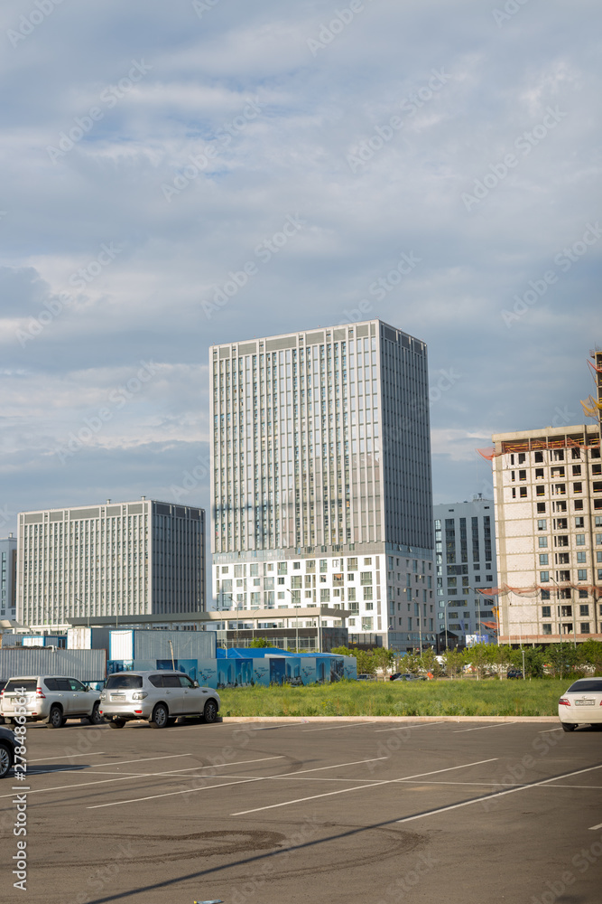 Astana, Kazakhstan - 11. 06. 2019: Walking through the city with a camera and photographs of various skyscrapers. The new capital of Kazakhstan is Astana.