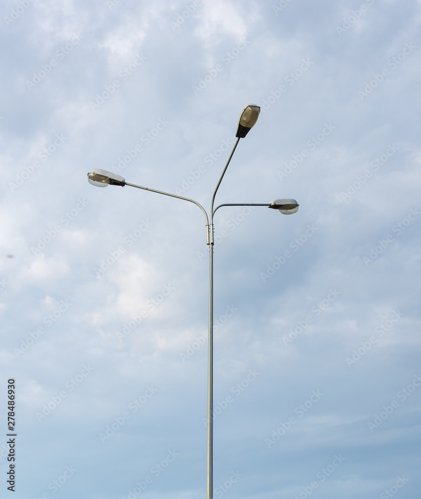 high street lights against the sky high street lights against the sky