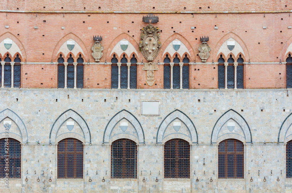 Obraz premium Exterior of Torre del Mangia in Piazza del Campo, Siena, Tuscany, Italy