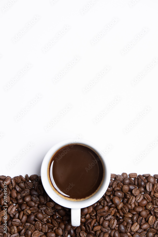 Fototapeta premium cup of coffee and beans on white background