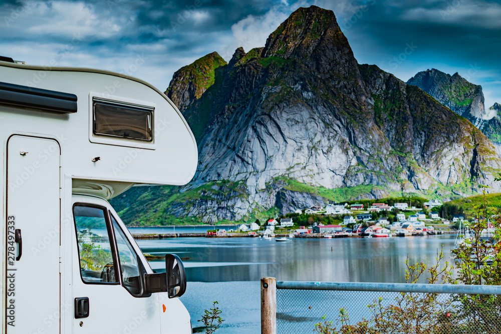 Camper car on fjord, Lofoten Norway