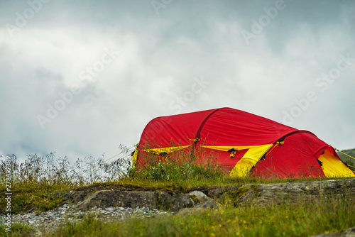 Red tent on nature. Camping