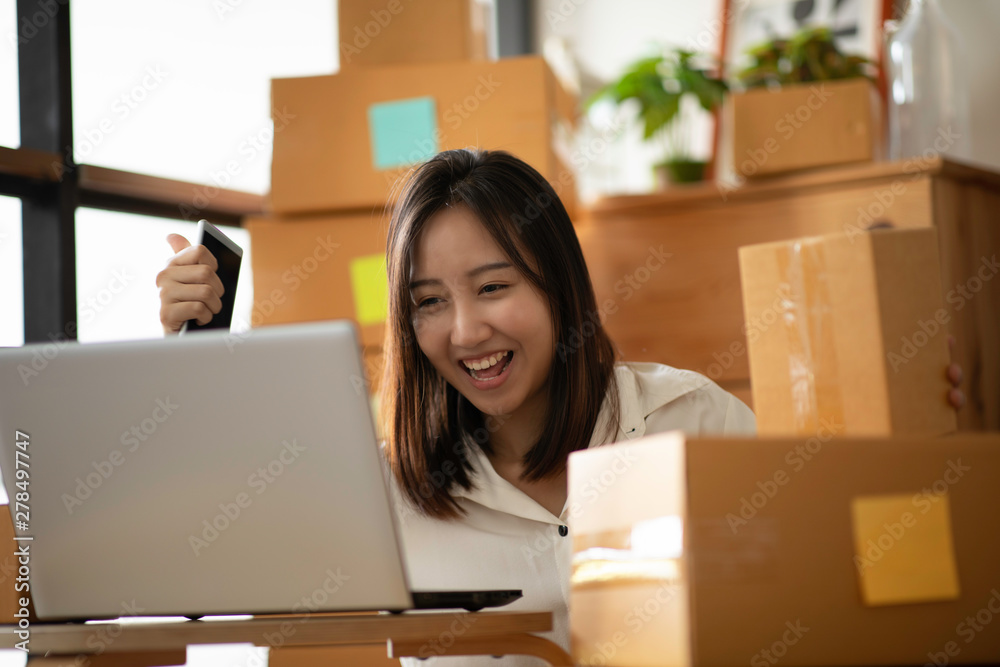 women Celebrating new order from Online shopping women Celebrating new order from Online shopping