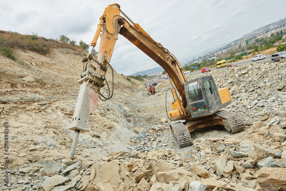 hydraulic breaker hammer excavator at demolition work foto de Stock | Adobe  Stock