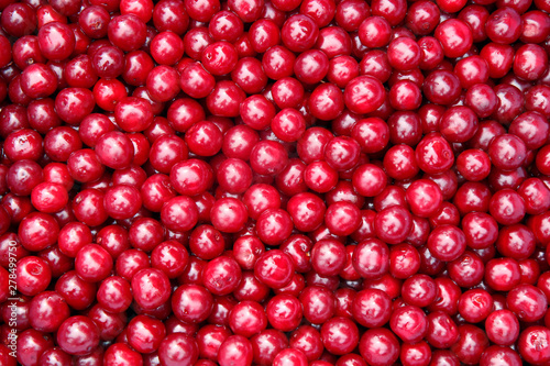 fresh red cherries as background