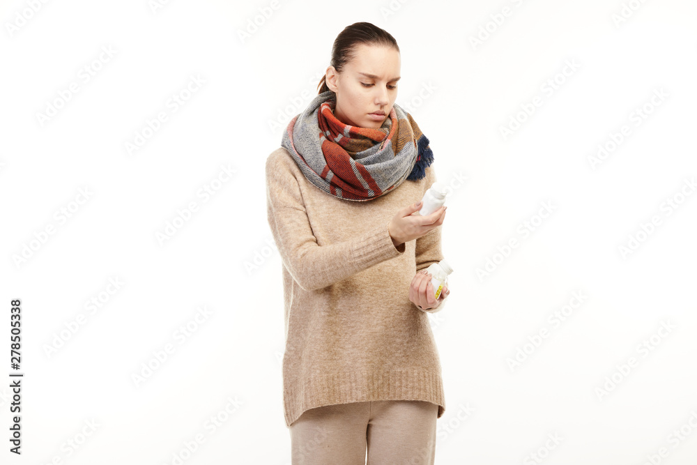Ill woman takes her medical prescription on the white background. Ill woman takes her medical prescription on the white background.