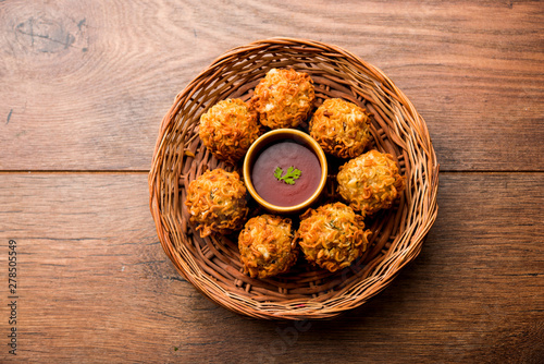 Crispy Noodles/maggie Pakora or pakoda is a popular indochinese street food served with ketchup photo