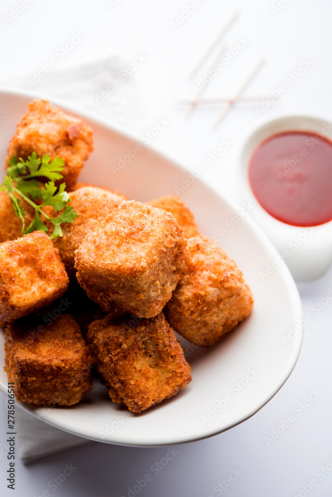 Crispy Paneer popcorn is a popular party snack and an appetiser. selective focus Crispy Paneer popcorn is a popular party snack and an appetiser. selective focus