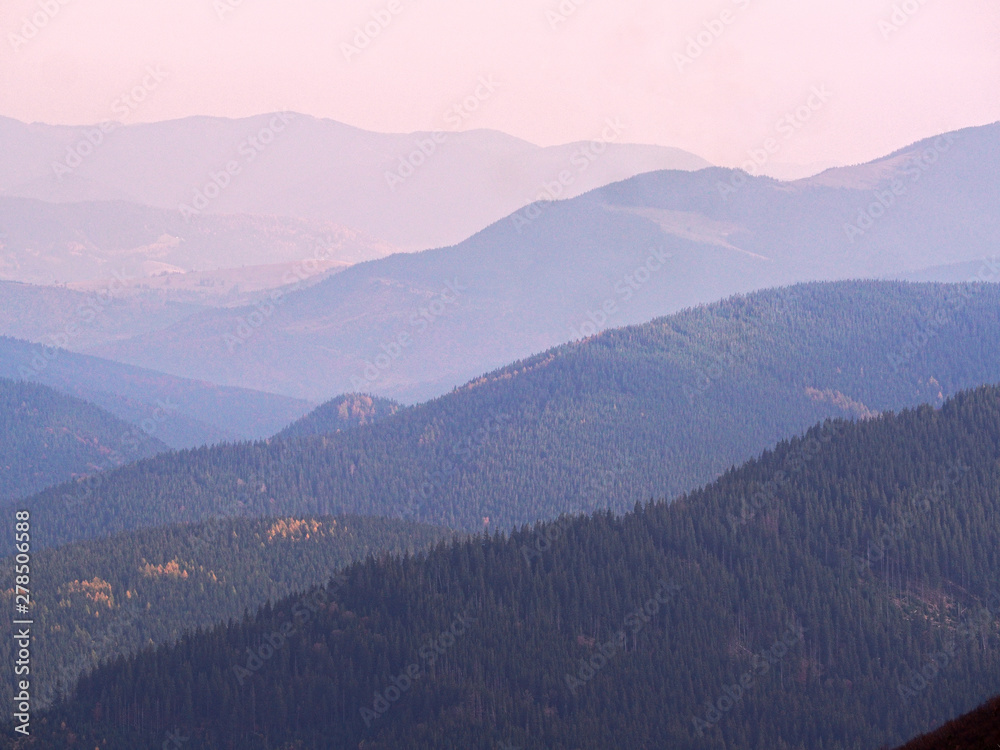 Fototapeta premium Carpatian village at mountains at the sunny day