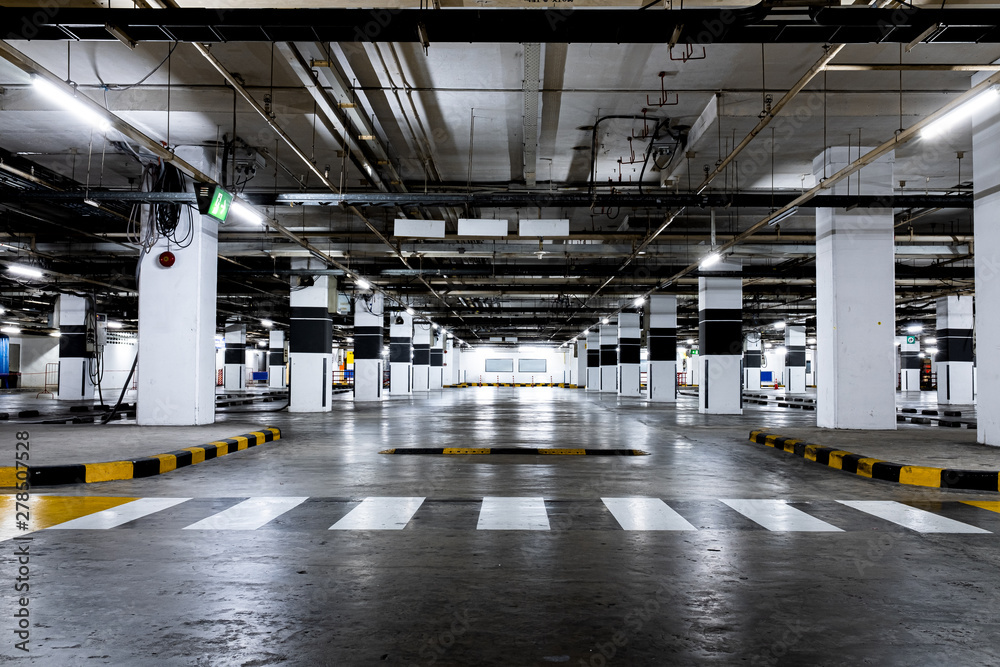 Indoor available car parking. Empty space Indoor available car parking. Empty space