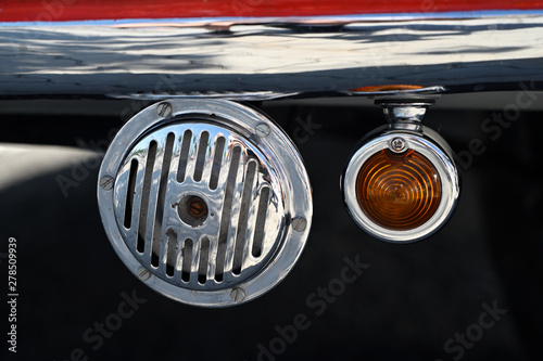 Fotografija Old horn and blinker in a vintage car.