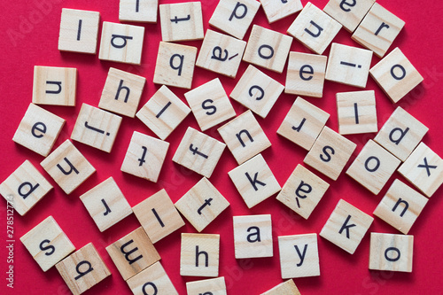 Alphabet letters on wooden scrabble pieces