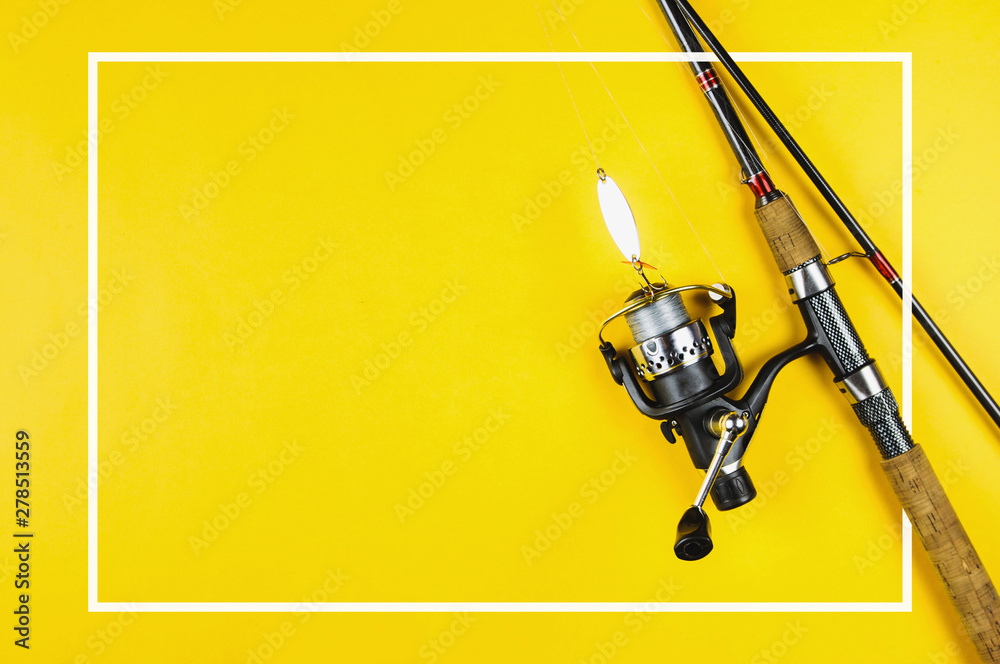 Spinning and tackle on yellow background Spinning and tackle on yellow background