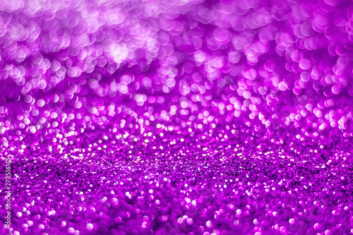 Glitter light abstract purple bokeh blurred background