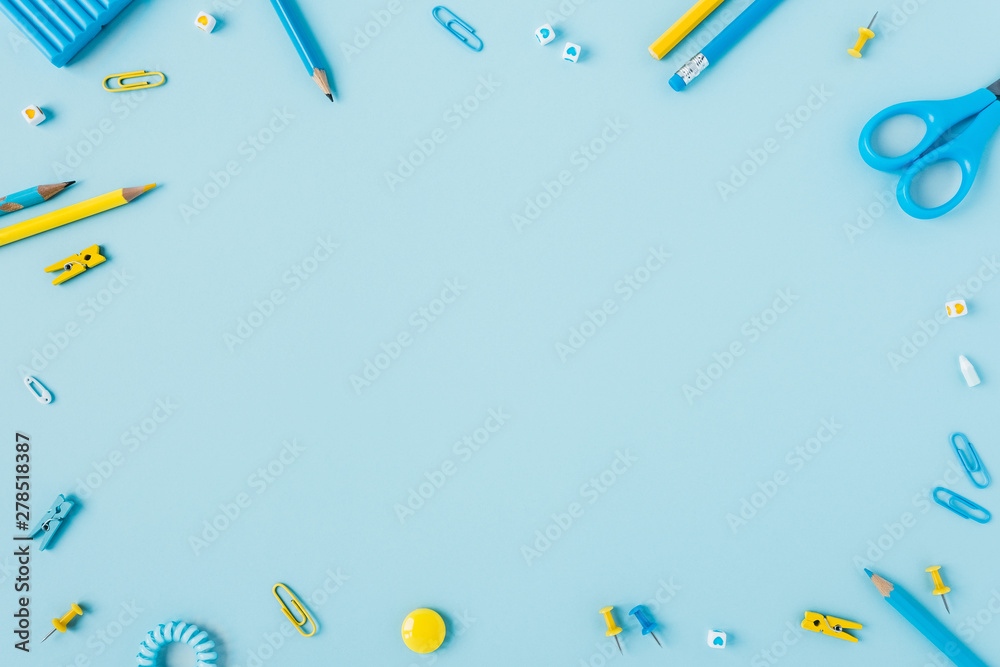 School Desk with scattered writing materials.